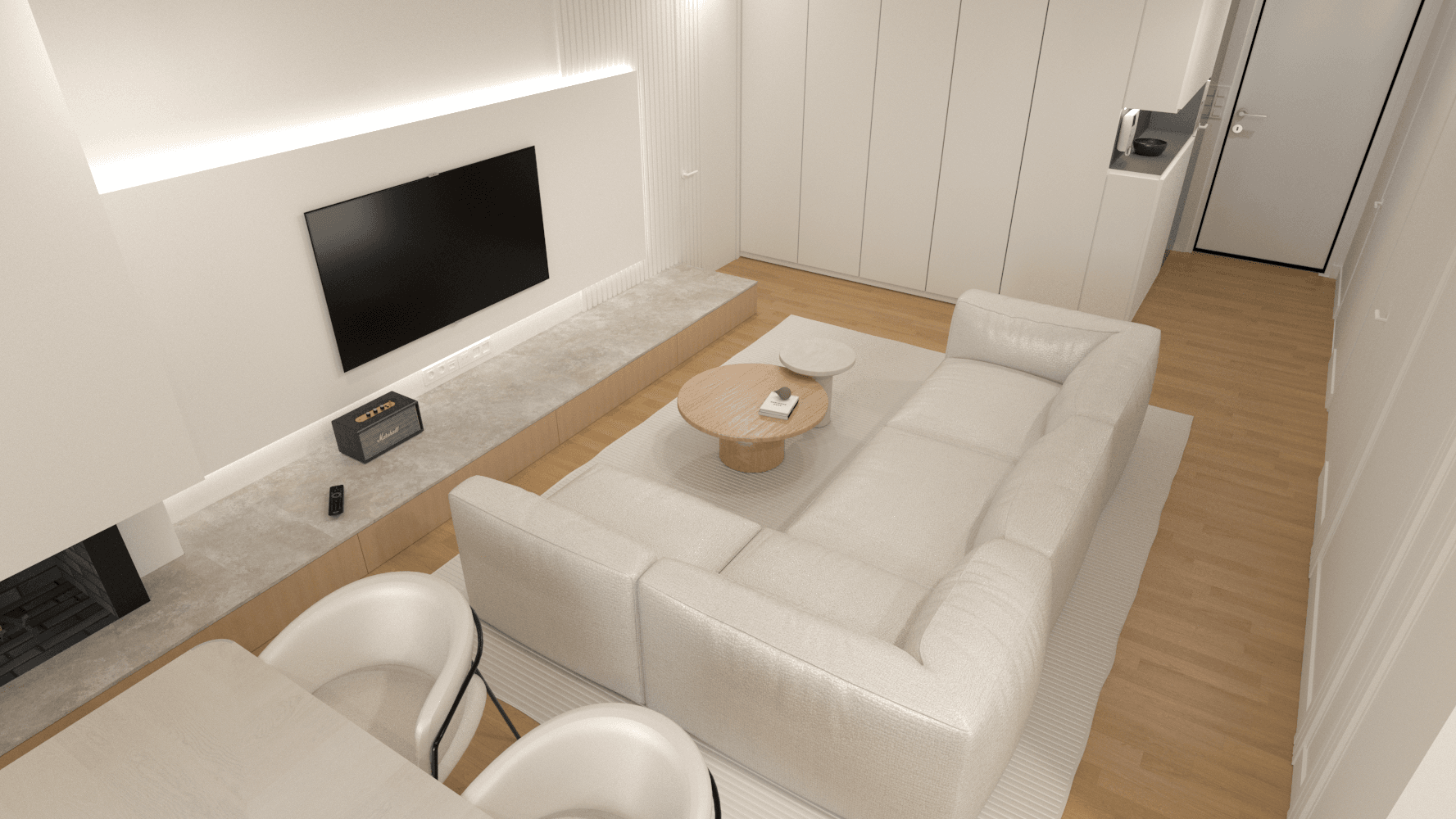 Overhead view of a pale sofa and coffee table facing the television wall — Voulas