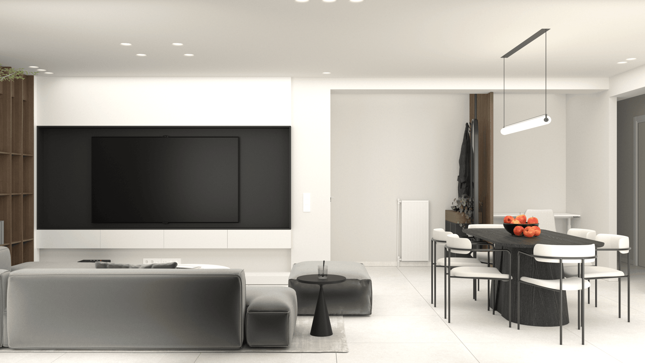Open-plan living and dining room with a large television and white cabinetry — Filostratou