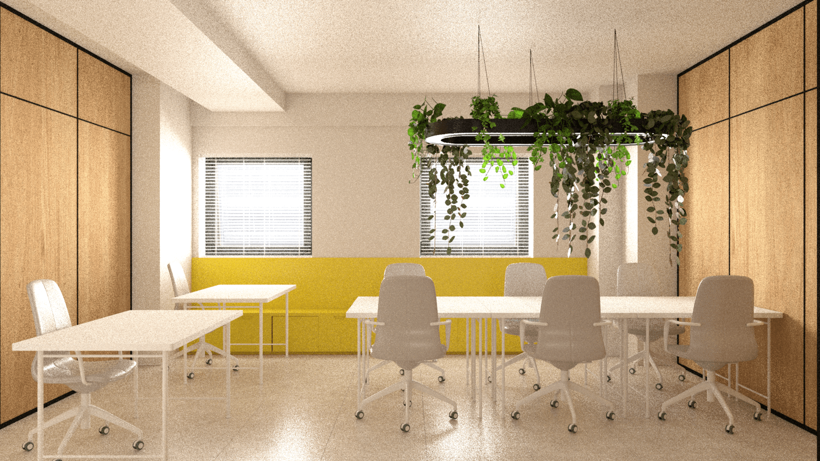 Shared office with white desks, a yellow seating nook and hanging greenery — Karaoli